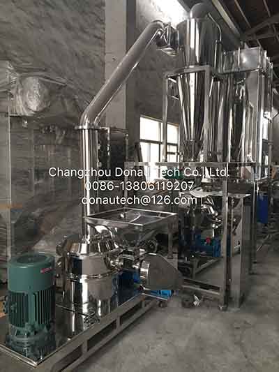 Fluidized bed coating system